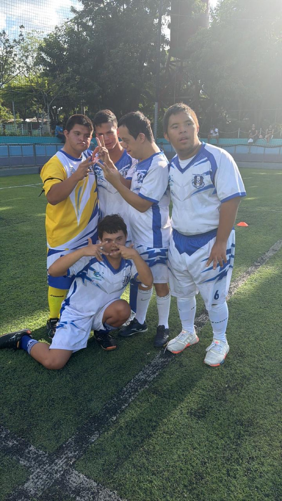 Children playing inclusive soccer together